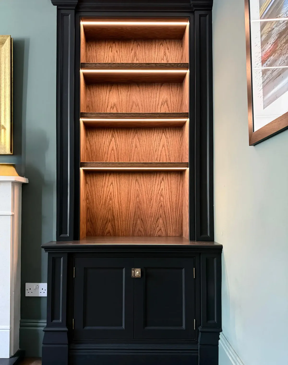 Handmade bespoke drinks cabinet in dark timber with interior lighting