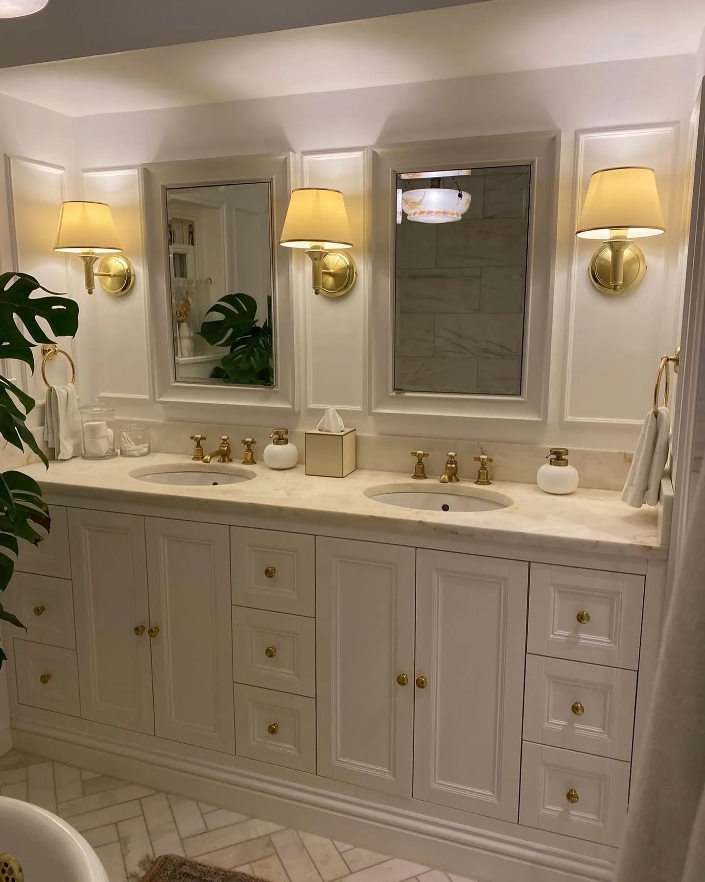 Bespoke luxury bathroom vanity cabinet with marble worktop and brass hardware